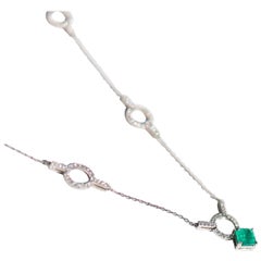 Platinum 0.65 Karat Emerald 0.0025 Karat Diamond Dress Necklace
