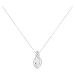 Collier en platine avec pendentif en diamant de 0.65ct