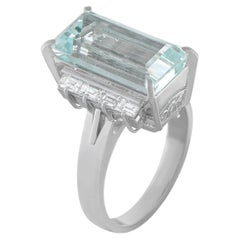 Anello in platino con diamante e acquamarina da 0.69 carati