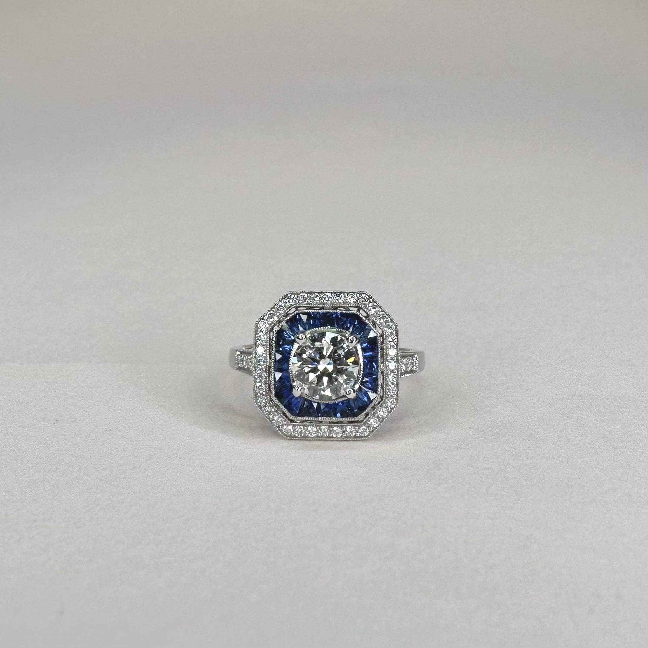 For Sale:  Art Deco Style Platinum Calibre Cut Sapphire Ring With 0.70 Carat Diamond GIA 3