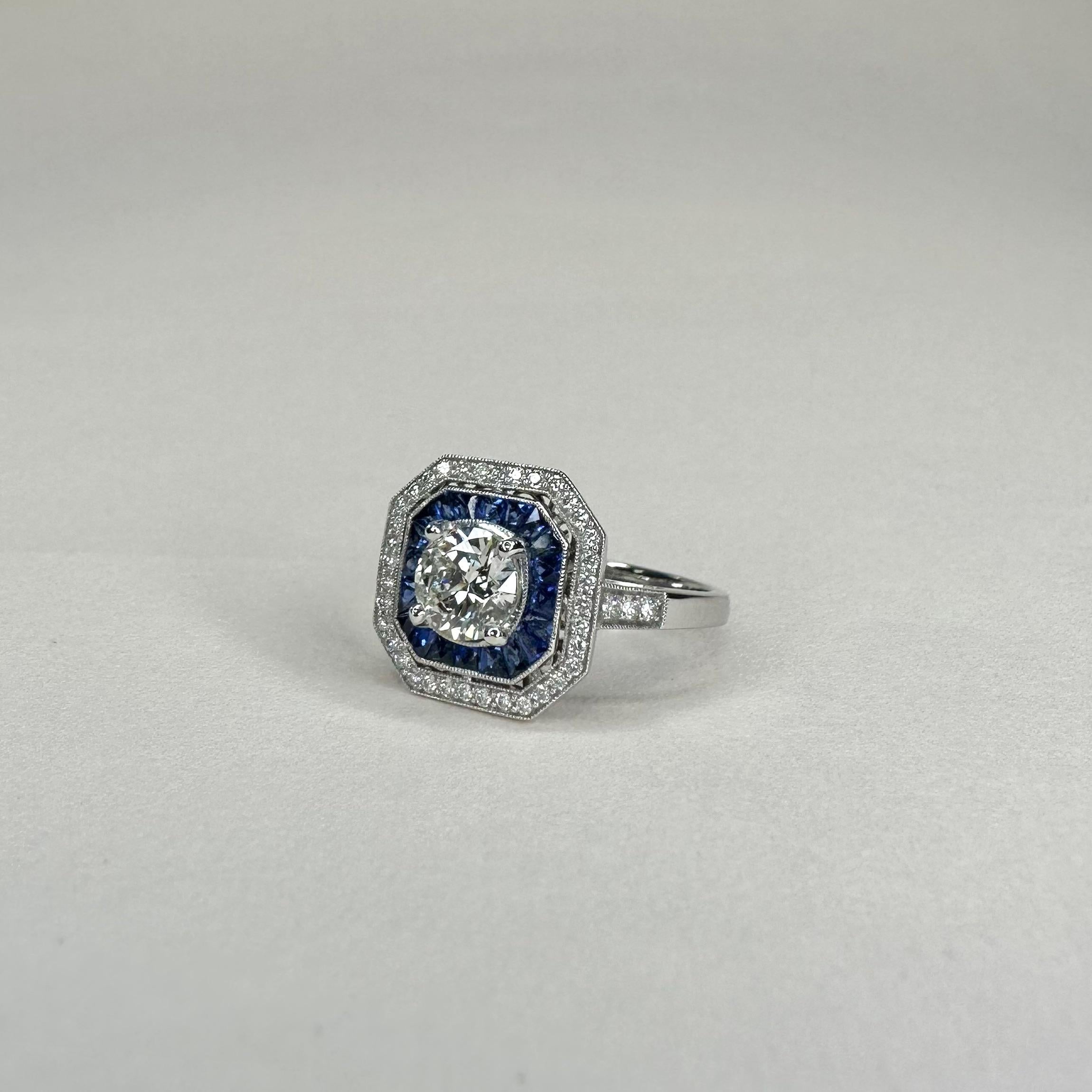 For Sale:  Art Deco Style Platinum Calibre Cut Sapphire Ring With 0.70 Carat Diamond GIA 4