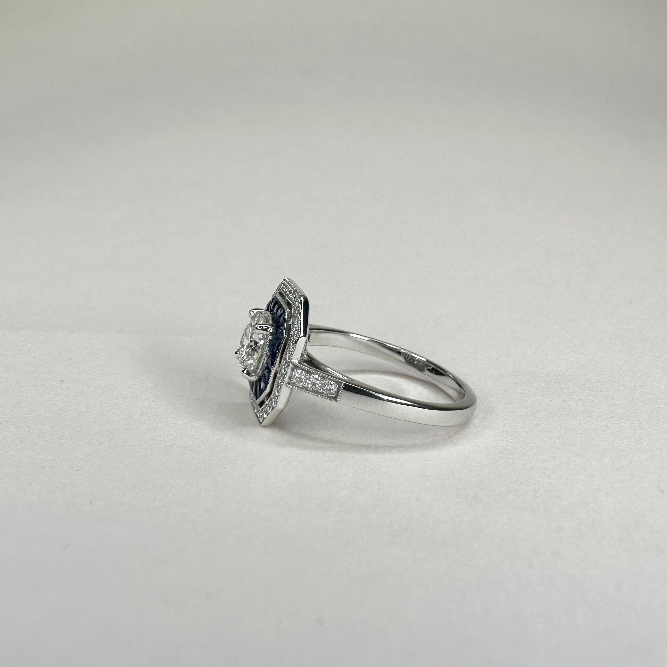 For Sale:  Art Deco Style Platinum Calibre Cut Sapphire Ring With 0.70 Carat Diamond GIA 5