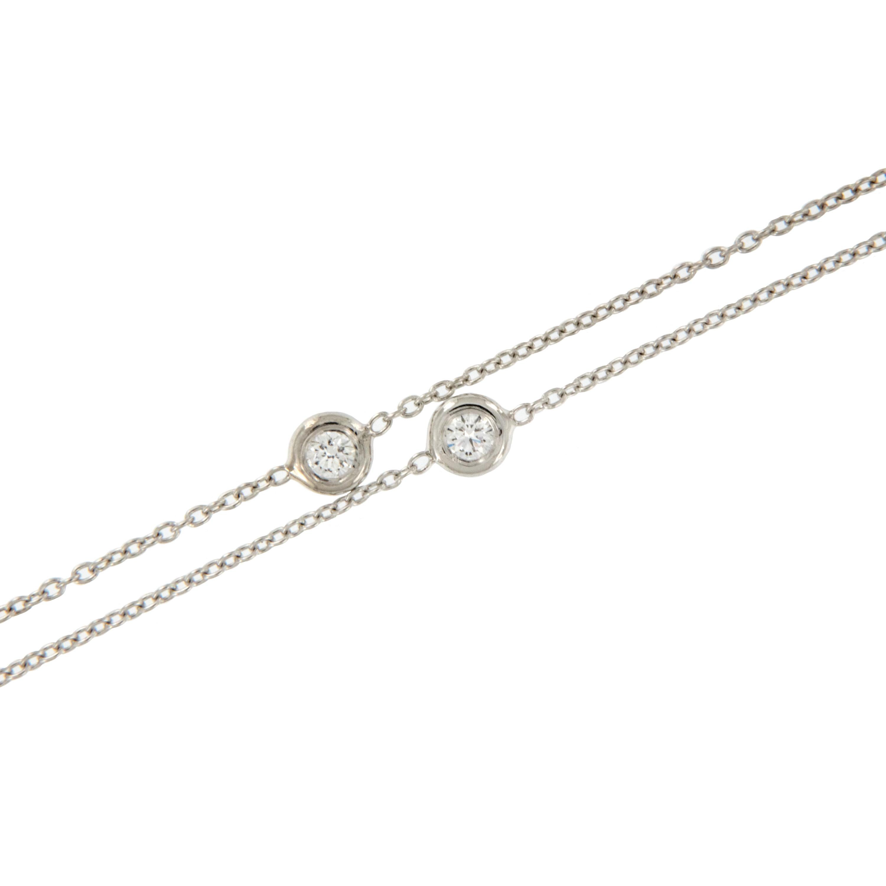 Made of pure, noble platinum with seven fine quality diamonds (VS clarity, F-G color) this station necklace stands the test of time! You can wear every day with jeans, yet it also looks fantastic dressed up on a little black dress! 16