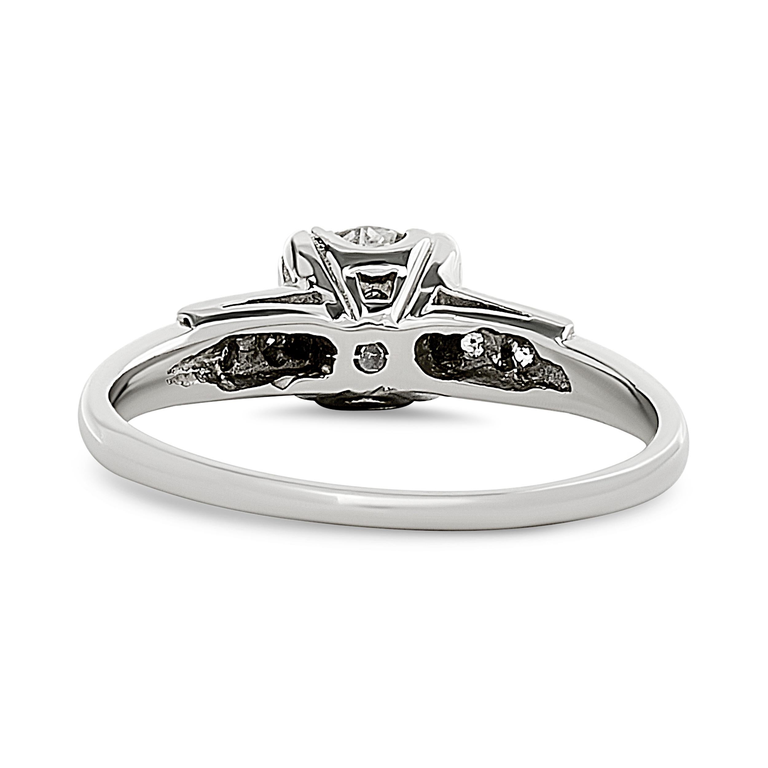 Round Cut Platinum 0.72 carat Diamond Vintage Estate Engagement Ring For Sale