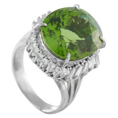 Anello in platino con diamante e peridoto da 0,78 carati #5354