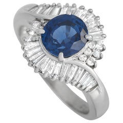 Anello in platino con diamante e zaffiro da 0,78 carati