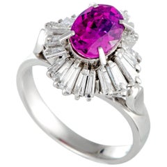 Platinum 0.80 Carat Diamond and Ruby Oval Ring