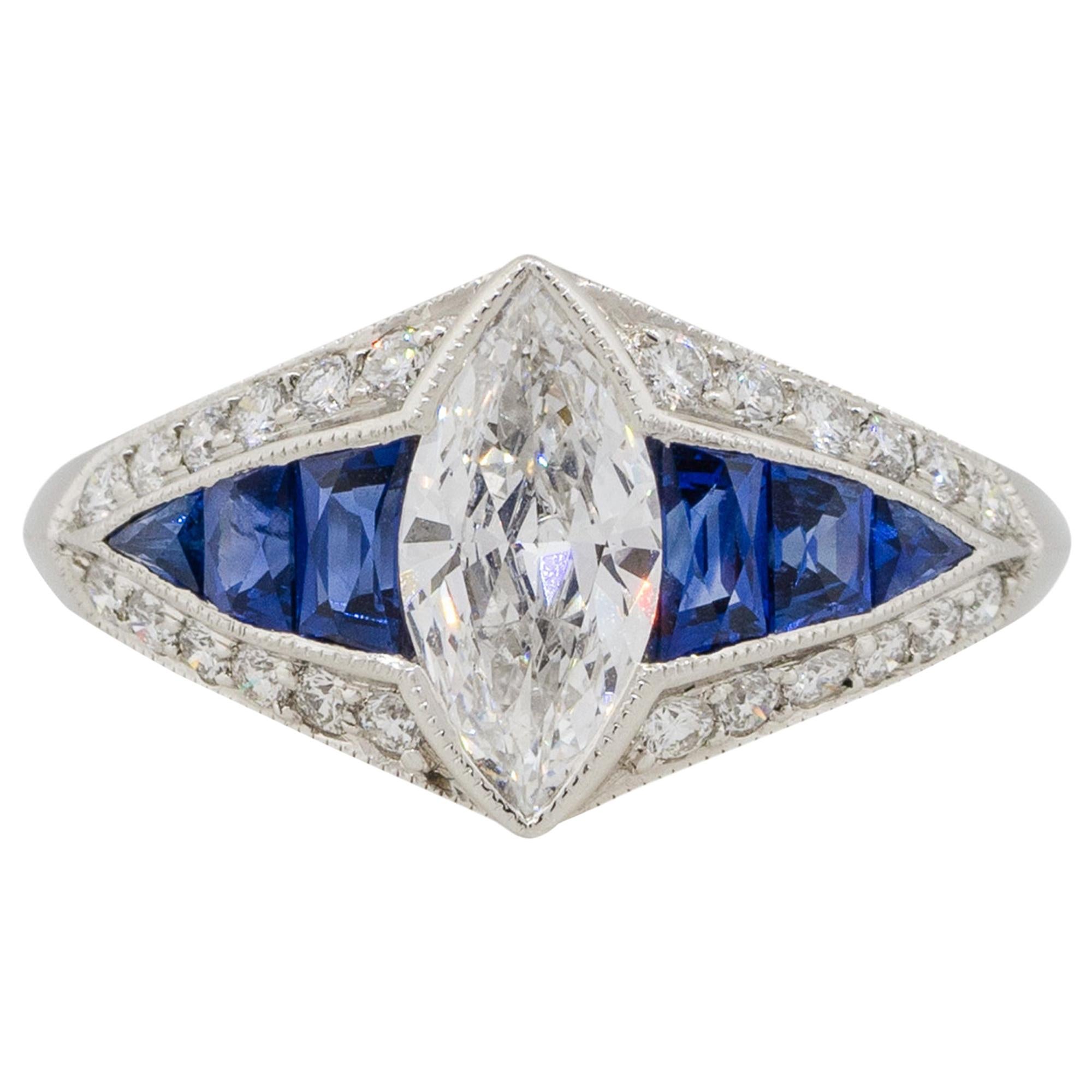Platinum 0.80 Carat Marquise Diamond Center Ring with Sapphires