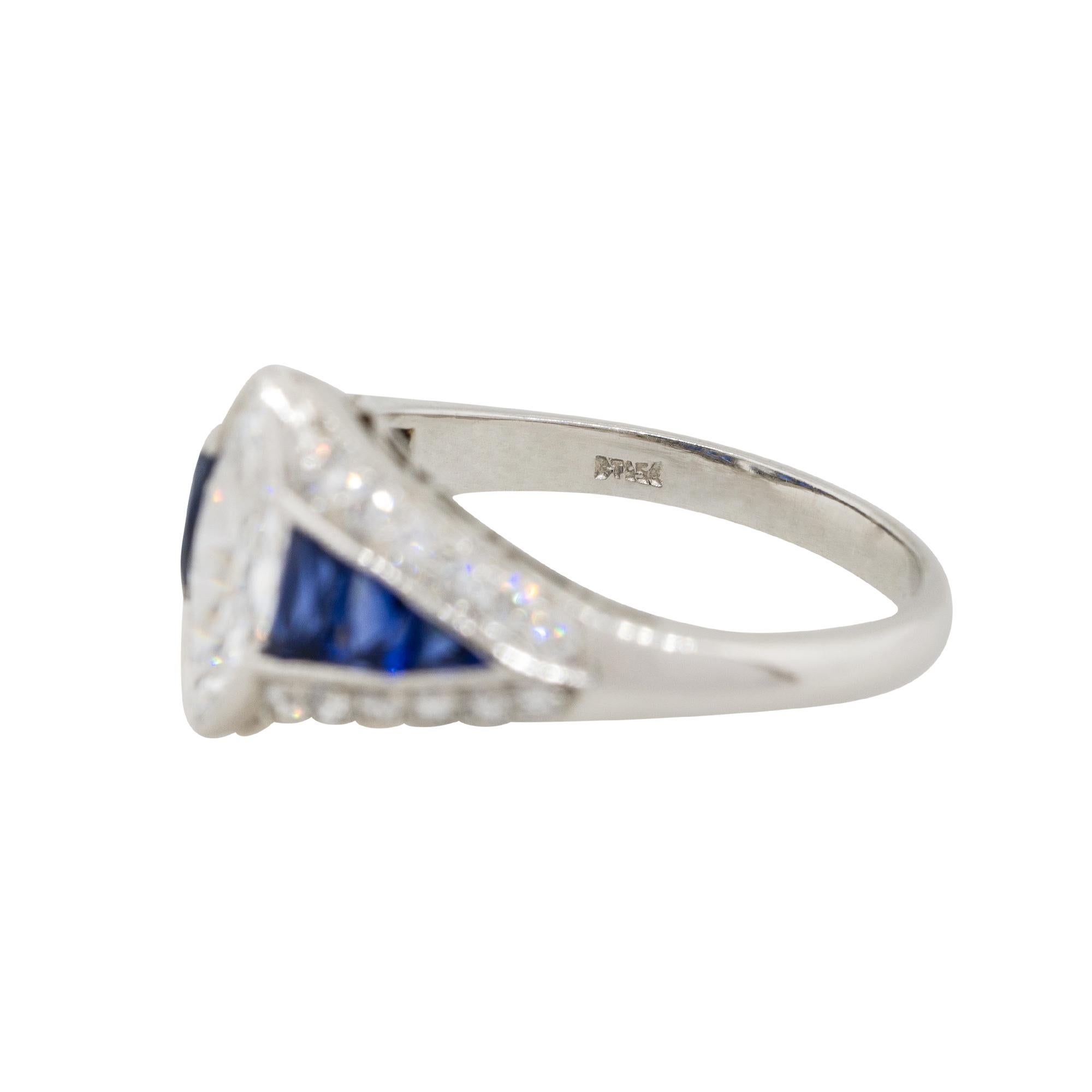 Platinum 0.80 Carat Marquise Diamond Center Ring with Sapphires In New Condition In Boca Raton, FL