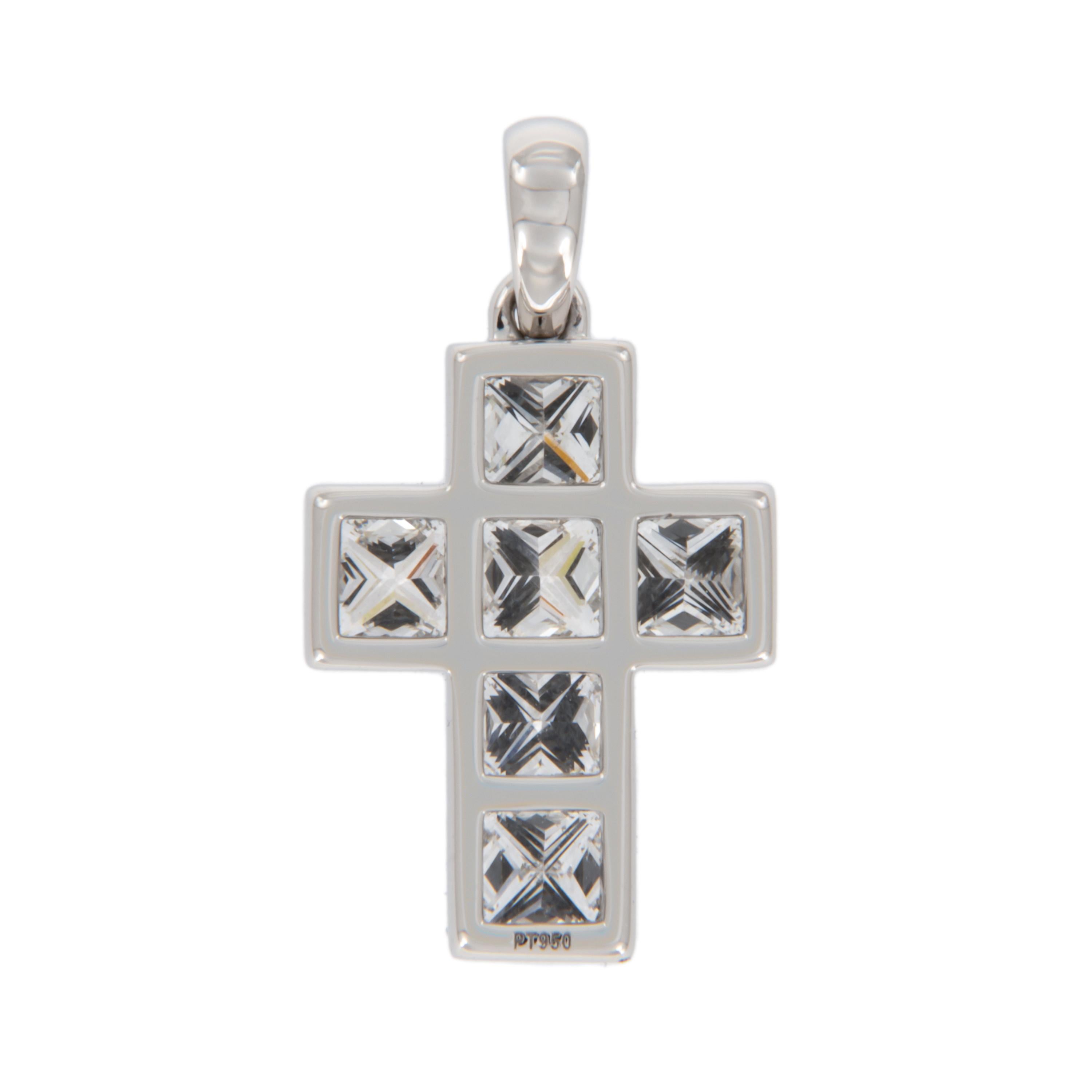  Contemporary cross channel set with 6 princess cut diamonds = 0.90 Cttw VS clairty, F-G color. Made from noble platinum in a perfect size-  9.5 x 17mm and on an 18KYG cable chain 18