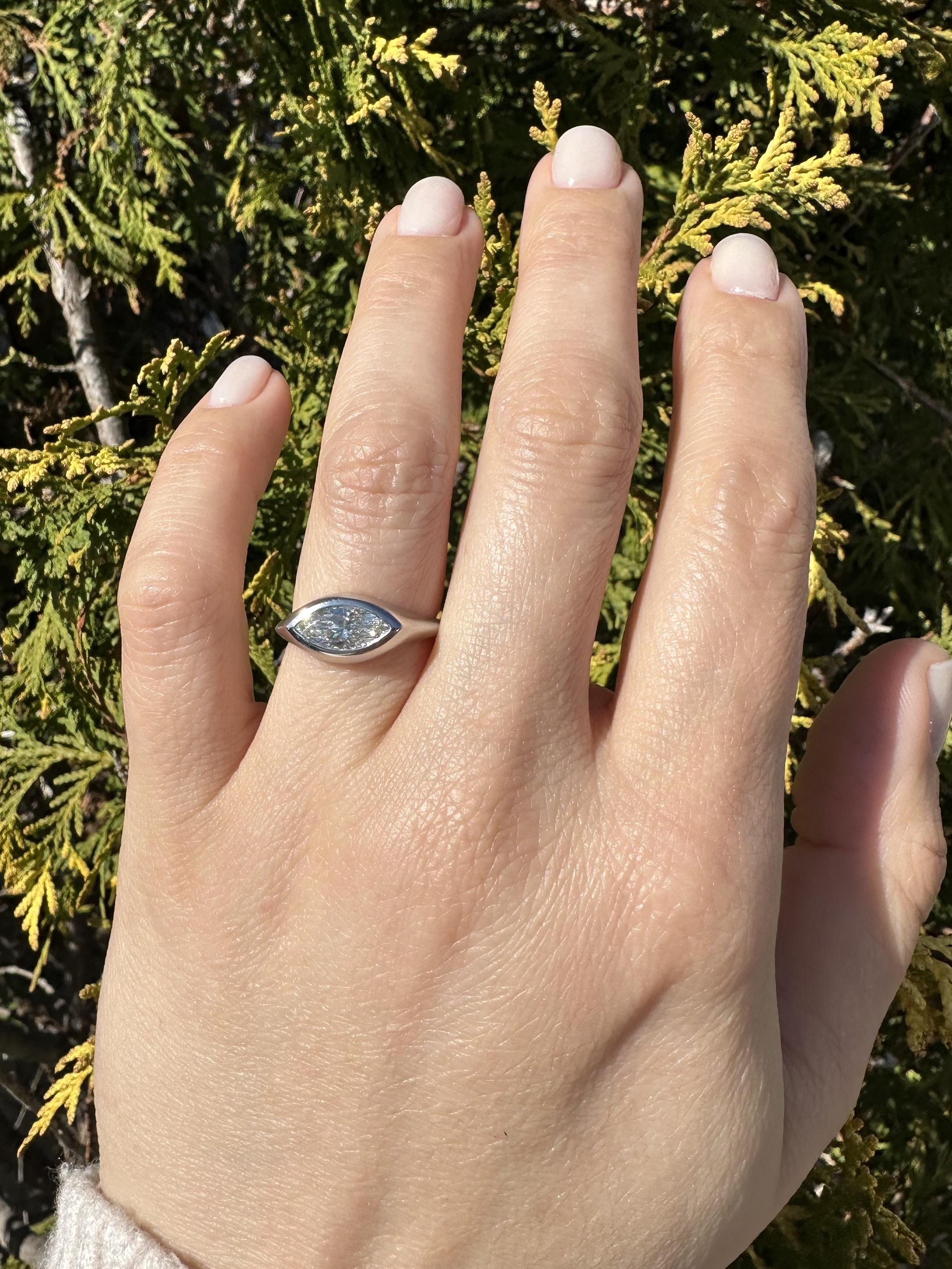 Platinum 0.91ct Marquise Cut Bezel Diamond Solitaire Brushed East West Band Ring In New Condition For Sale In Montclair, NJ