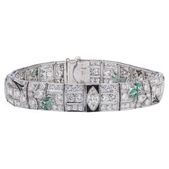 Platinum 10. ct. Diamond, Onyx, and Emerald Bracelet