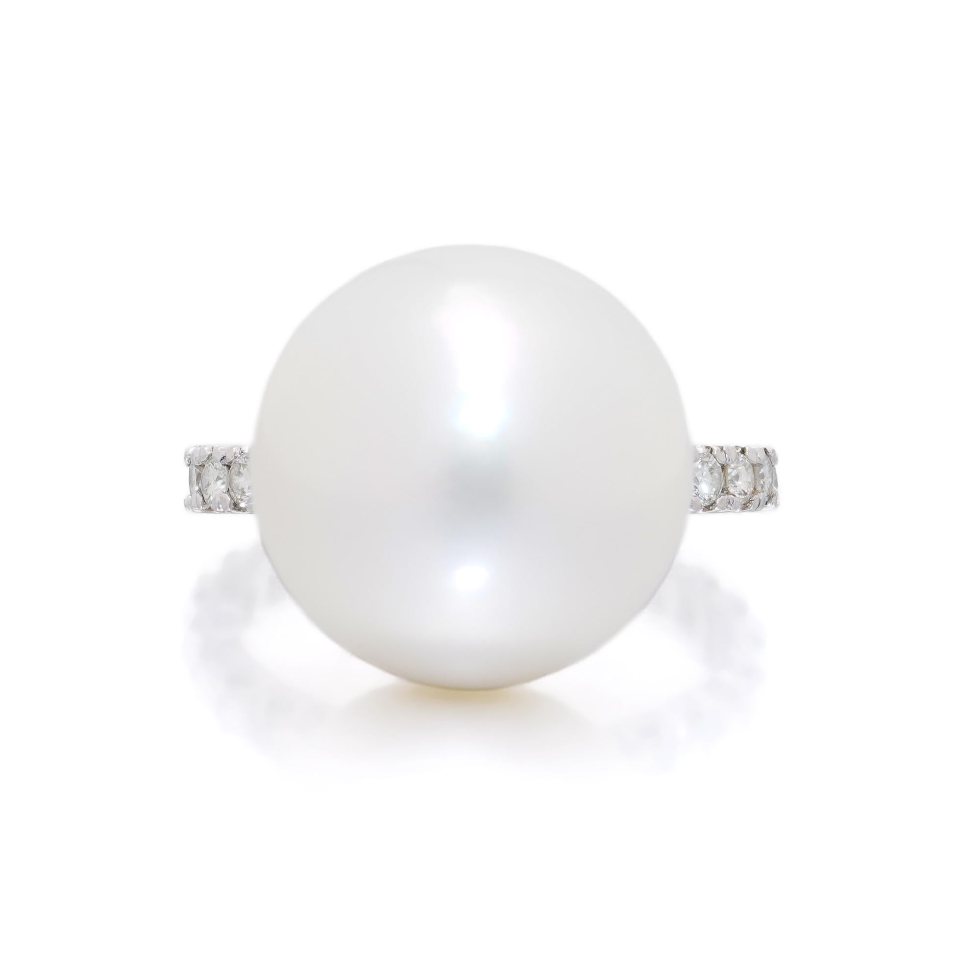 Elegant and modern platinum ring featuring a large white South Sea pearl atop a band pavé-set with round brilliant-cut diamonds.  
Period: Contemporary, Circa 2000s

Specifications:
Metal: Platinum
Finger Size: L (UK) — EU 51.5 
US