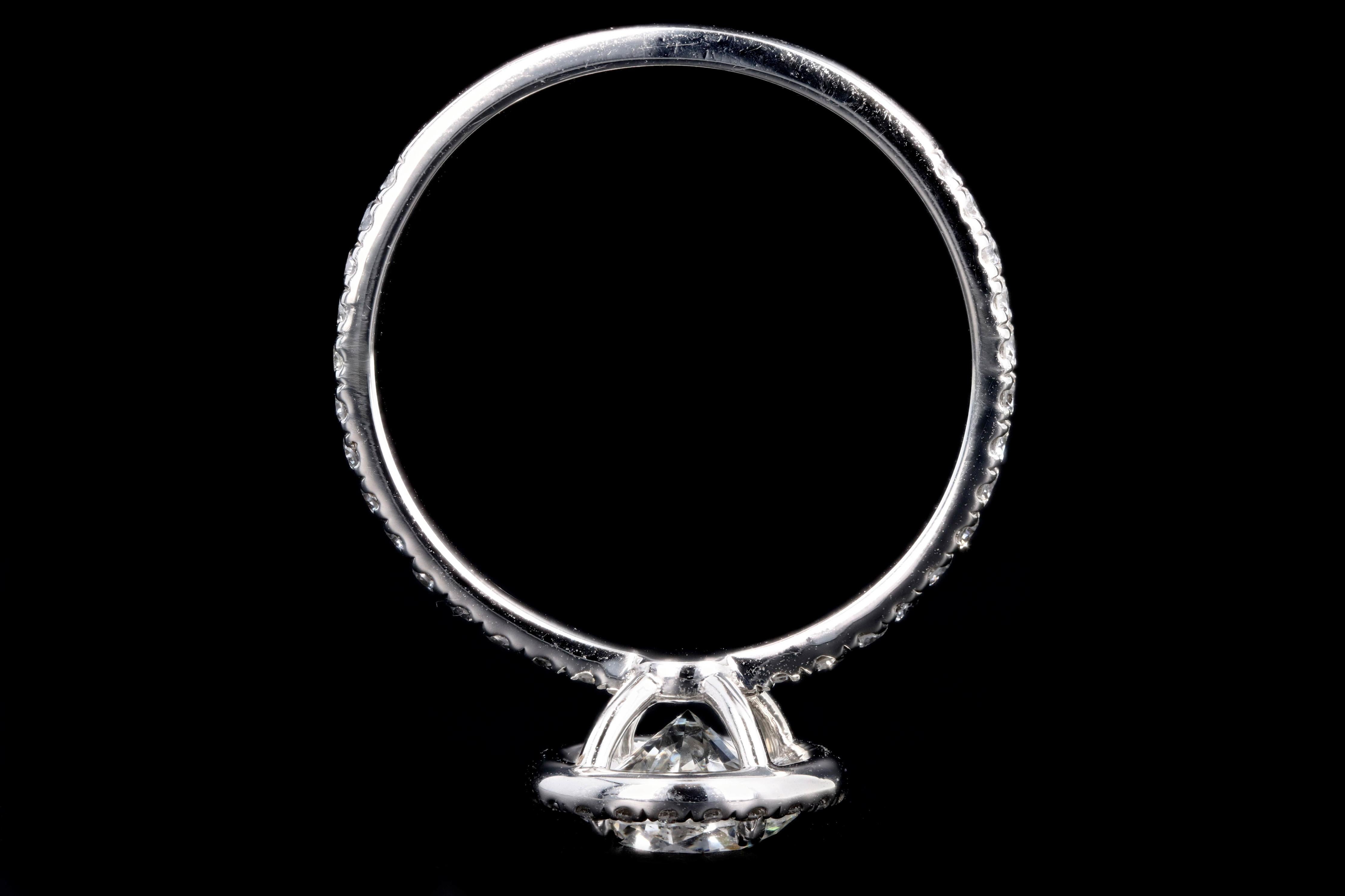 Women's Platinum 1.01 Carat Round Brilliant Cut Diamond Halo Engagement Ring