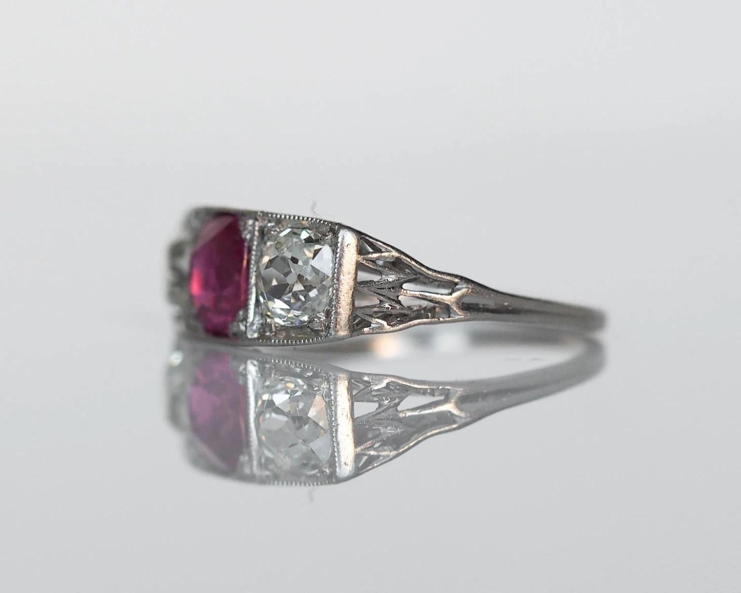 Size: 5.25
Metal Type: Platinum 
Weight: 3.3 g

Gem Stone Details:
Type: Ruby - Natural, Unheated
Shape: Antique Cushion
Color: Red
Size: 1.14ct 

Diamond Details: 
Shape: Antique Cushion Cut
Weight: .60ct x 2 = 1.20ct total weight. 
Color: