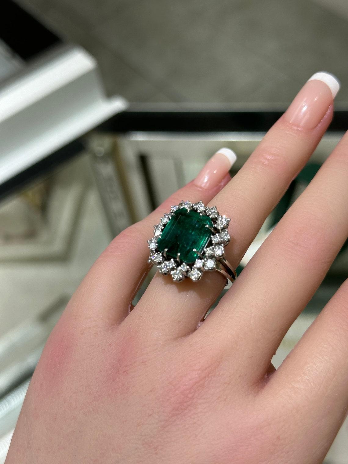 Art Deco Platinum 10.40tcw Vintage Emerald Cut Emerald & Diamond Halo Ring, Dark Green For Sale