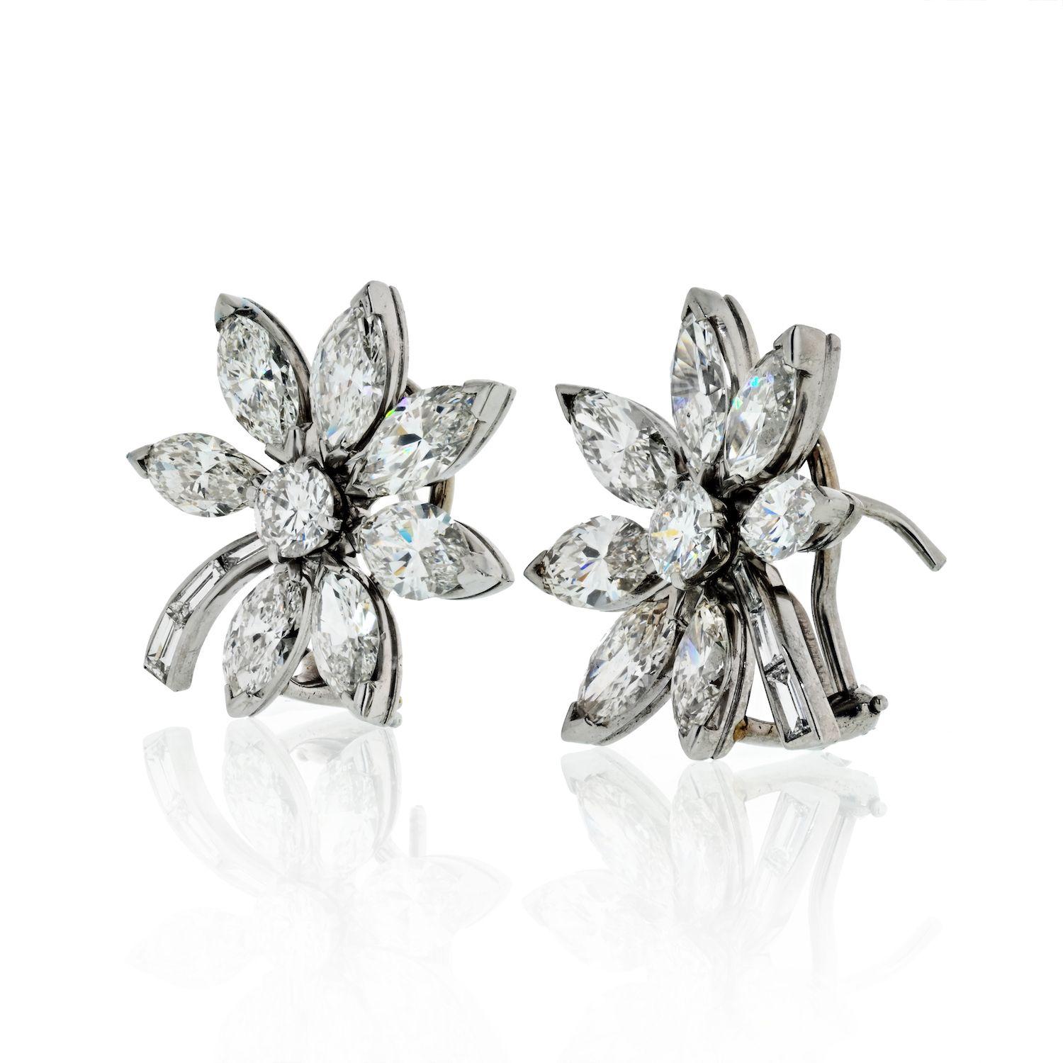 Round and marquise shaped diamond earrings from our starflower collection in platinum. Made with 14 marquise cut diamonds, 2 round cut diamonds and 6 baguette cuts. 
Total carat of these vintage earrings is 11.30cts (approx.)
Post back with omega