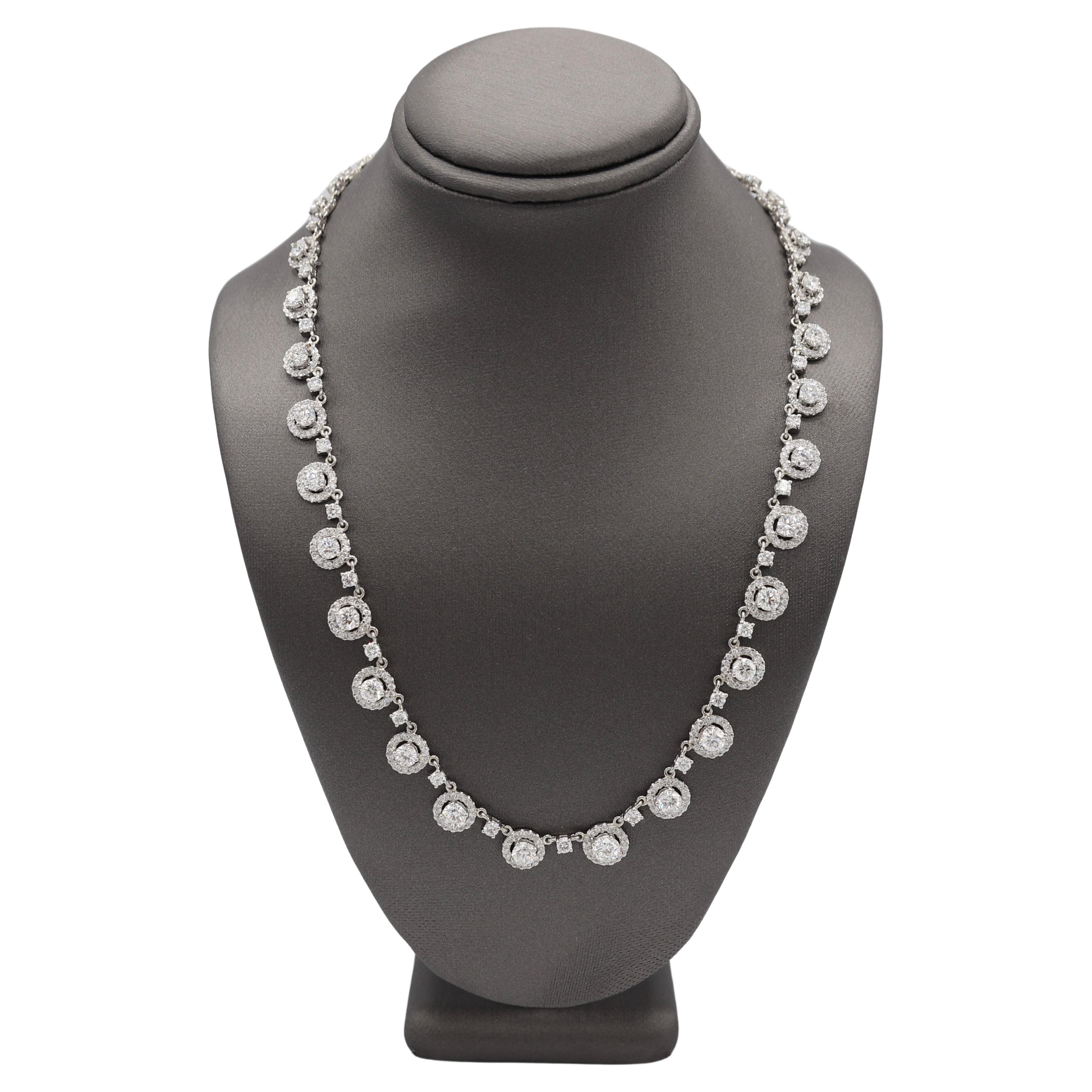 Platinum 11.71 Carat Natural Diamond Halo Riviera Necklace 
Metal: Platinum
Weight: 39.5 grams
Diamonds: 11.71 CTW natural round F-G VS diamonds. The largest diamond in the center is approx. .50cts. 
Length: 16 inches

