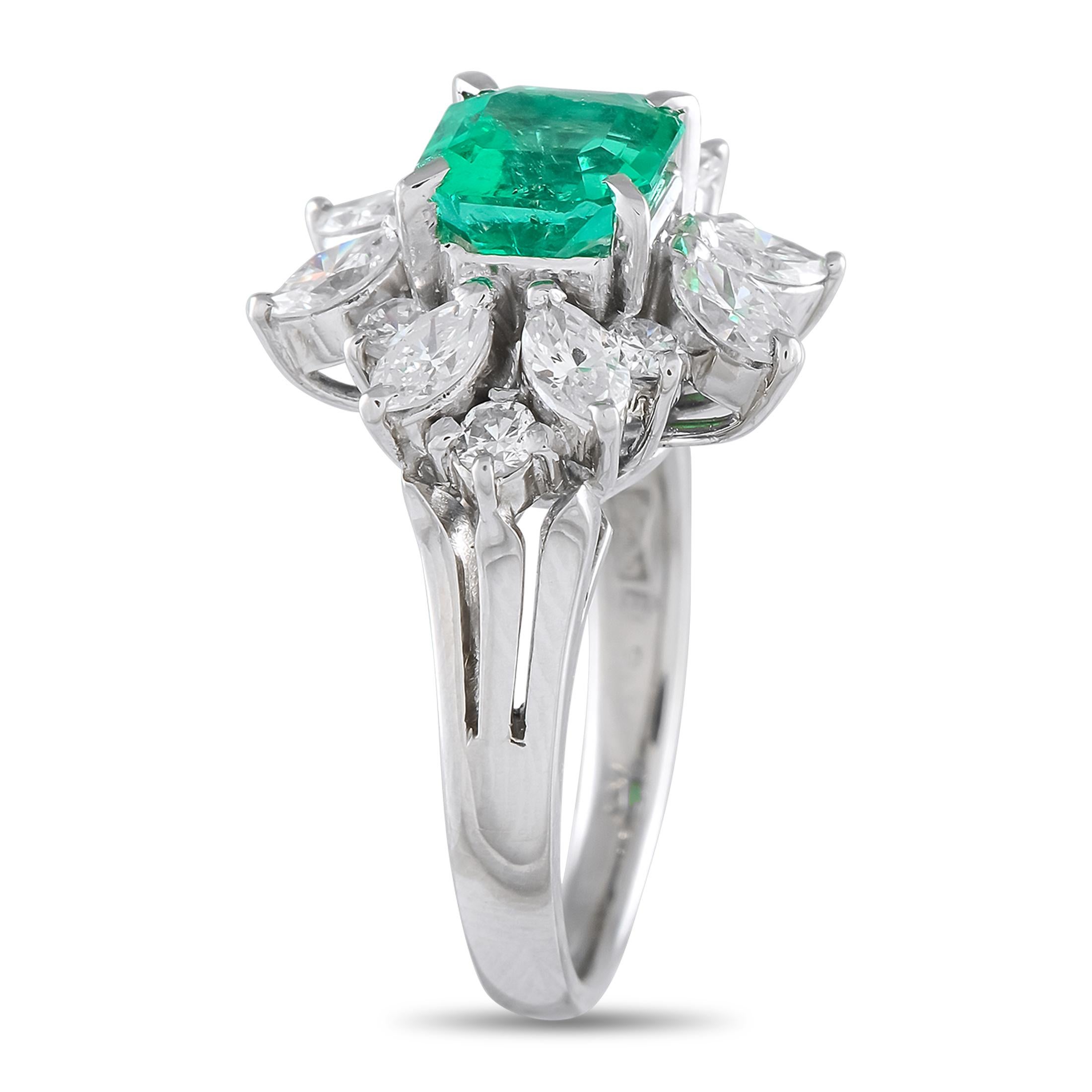 This luxury ring will never go out of style. At the center of the detailed Platinum setting, a 1.30 carat Emerald adds a breathtaking pop of color. For added visual impact, the center stone is also surrounded by a dynamic halo of Diamonds totaling