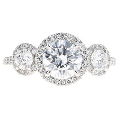 Platinum 1.20 Carat Round Brilliant Diamond Three Stone Halo Engagement Ring
