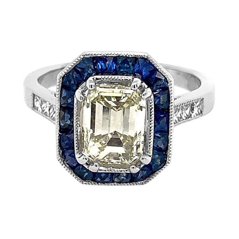 Platinum 1.20 Carat Sapphire 2.02 Carat Emerald Cut Diamond Ring For Sale