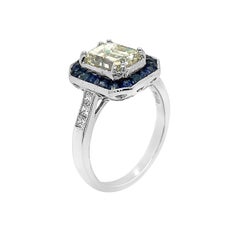 Platinum 1.20 Carat Sapphire 2.02 Carat Emerald Cut Diamond Ring