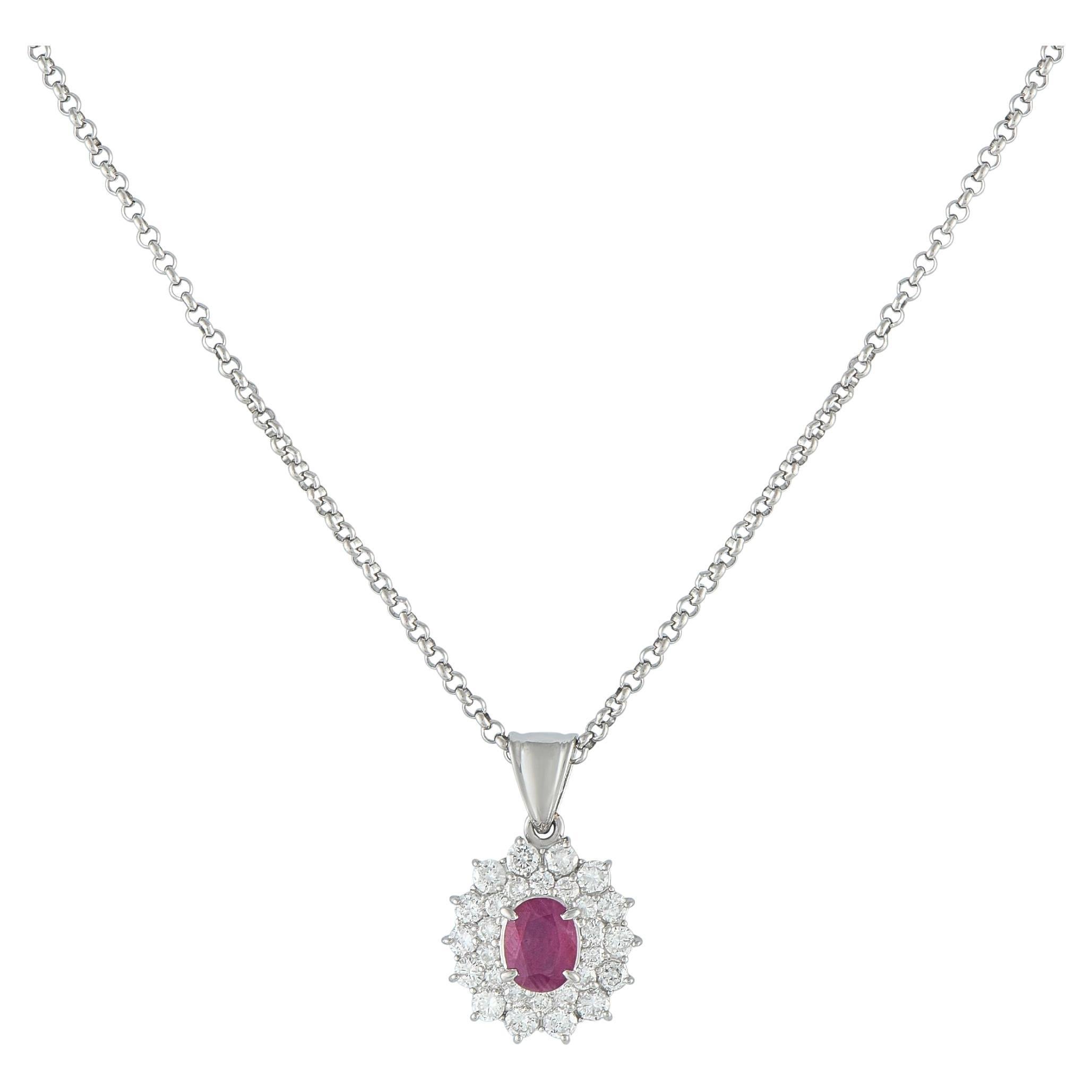 Collana con doppio pendente ovale in platino con diamanti e rubini da 1,24 ct.