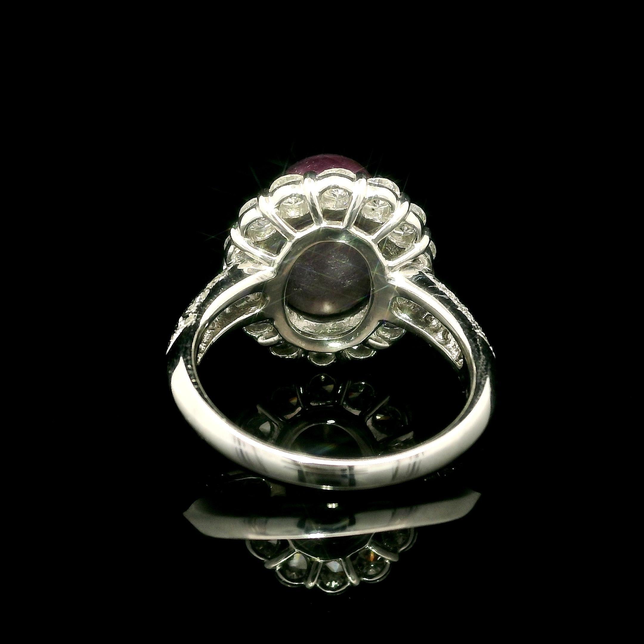 --Stone(s):--
(1) Natural Genuine Star Ruby - Oval Cabochon Cut - Claw Prong Set - No Heat - Purplish-Red Color - Nice Star - 11.25ct (exact)
(26) Natural Genuine Diamonds - Round Brilliant Cut - Prong & Pavé Set - G-I Color - VS2 Clarity - 1.37ctw