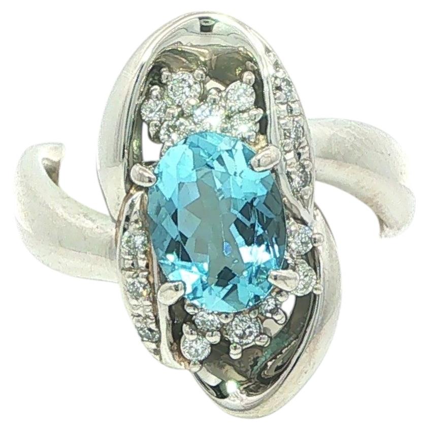 Platinum 1.28ctw Oval Rich Blue Aquamarine and Diamond Long Freeform Ring For Sale