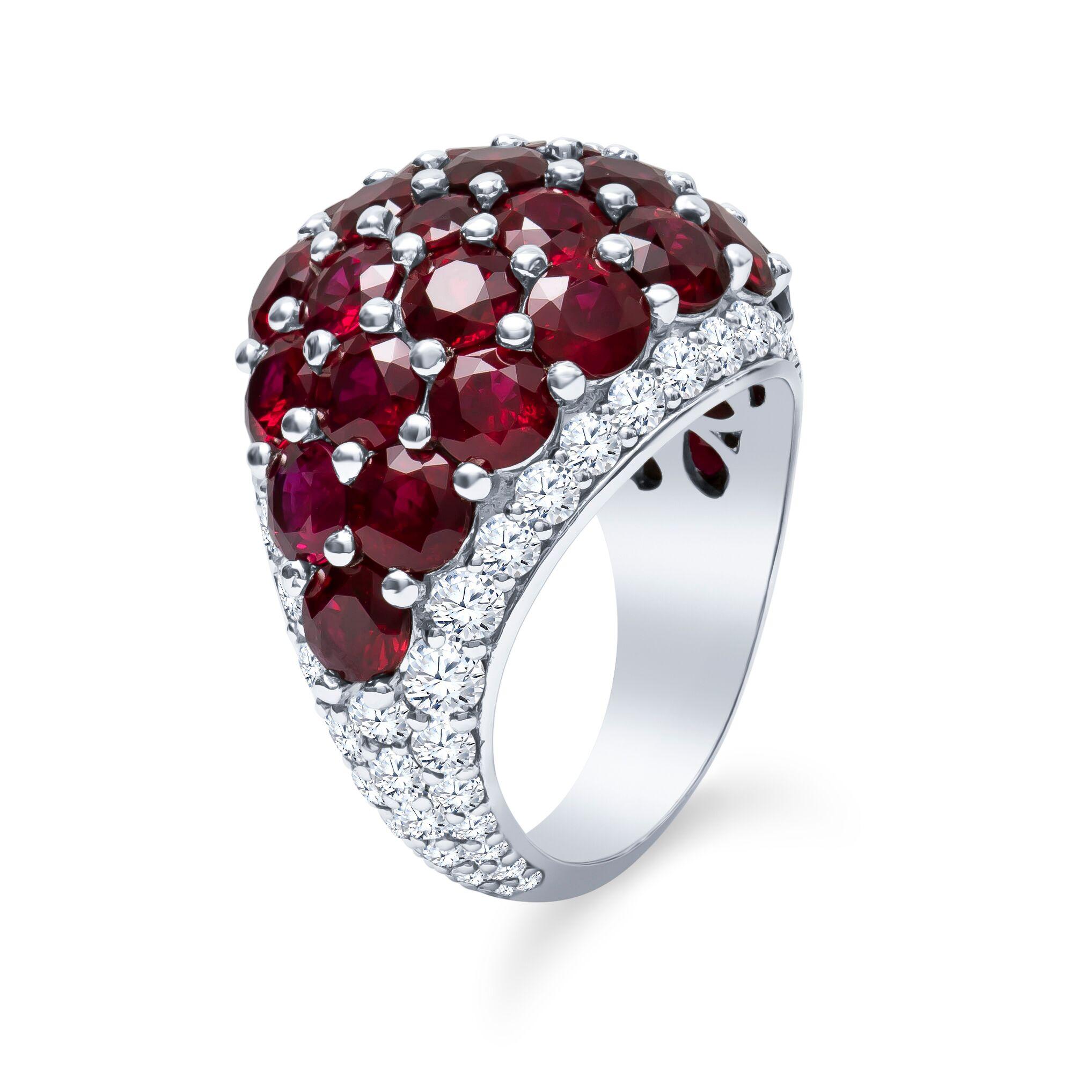 Custom Platinum 12.92 CTW Natural Ruby & Diamond Dome Ring 16.5 Grams Size 6.5

Twenty Seven Round Natural Red Rubies, Of About 4.3mm Each, 
Weighing Approximately 11.46 Carat Total Weight.

Sixty Eight Round Brilliant Cut Natural Diamonds,