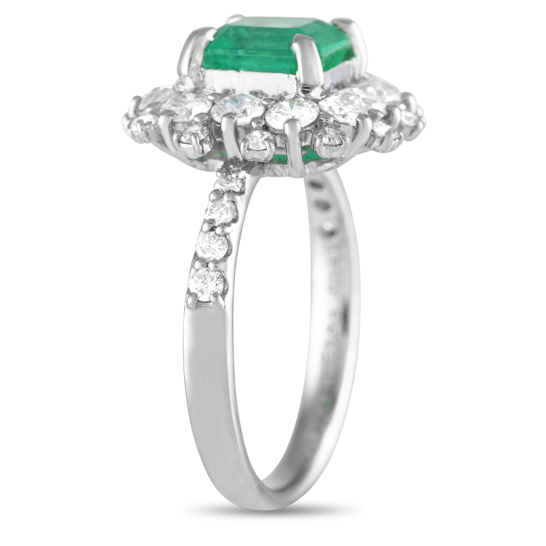 Fresh and feminine, this diamond and emerald ring makes an unconventional yet undeniably stunning engagement ring. It features a 950 platinum band with four tapering diamonds on each shoulder. A 1.53 carat emerald sits on top, surrounded by charming