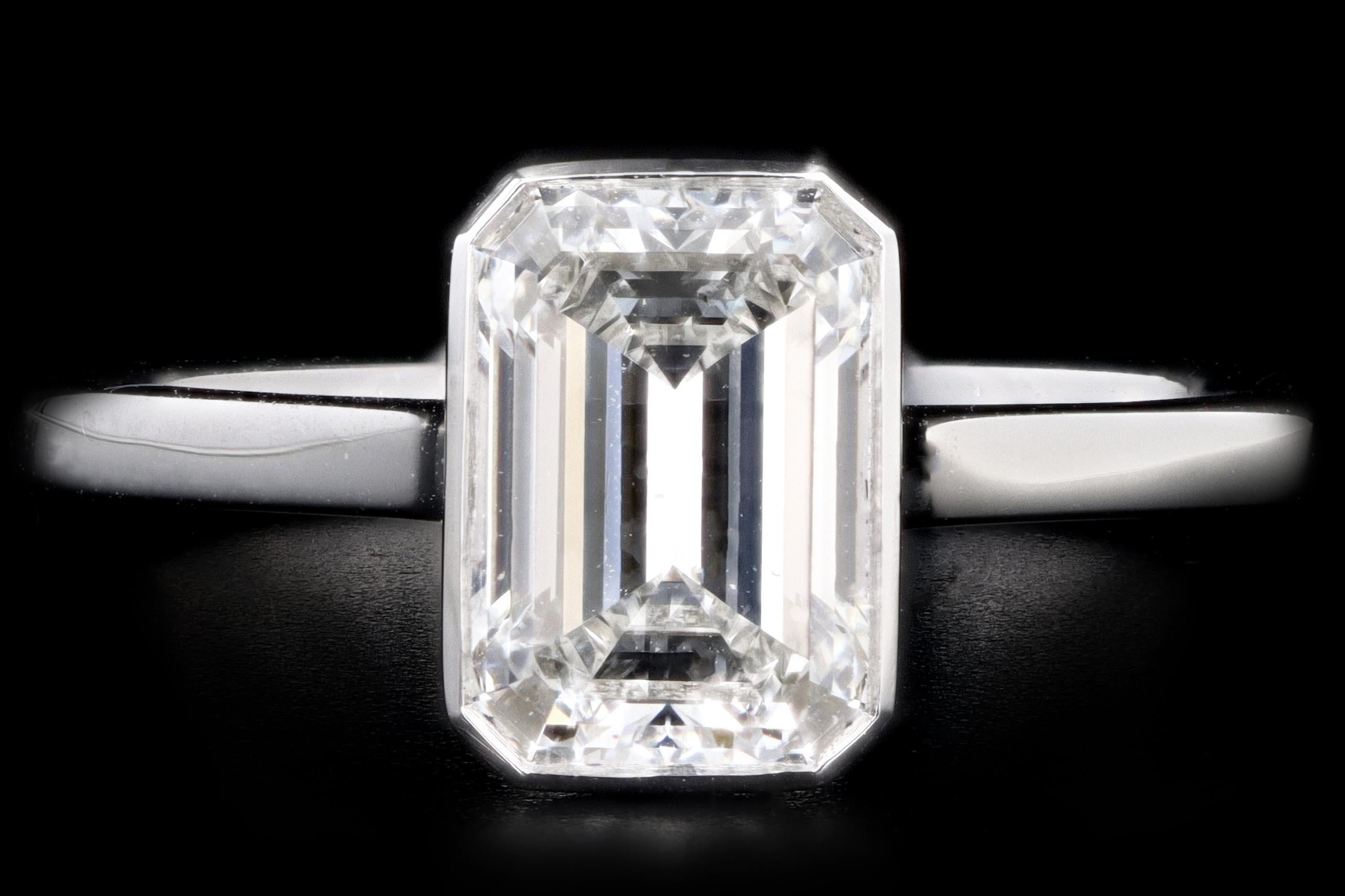 Era: New

Composition: Platinum

Primary Stone: Emerald Cut Diamond

Carat Weight: Approximately 1.37 Carats

Color/Clarity: H / SI1

GIA Report Number: 2211407212

Ring Size: 6

Ring Weight: 3.7 Grams

Item Barcode: 338414