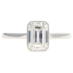 Platinum 1.37 Carat Emerald Cut Diamond Bezel Engagement Ring