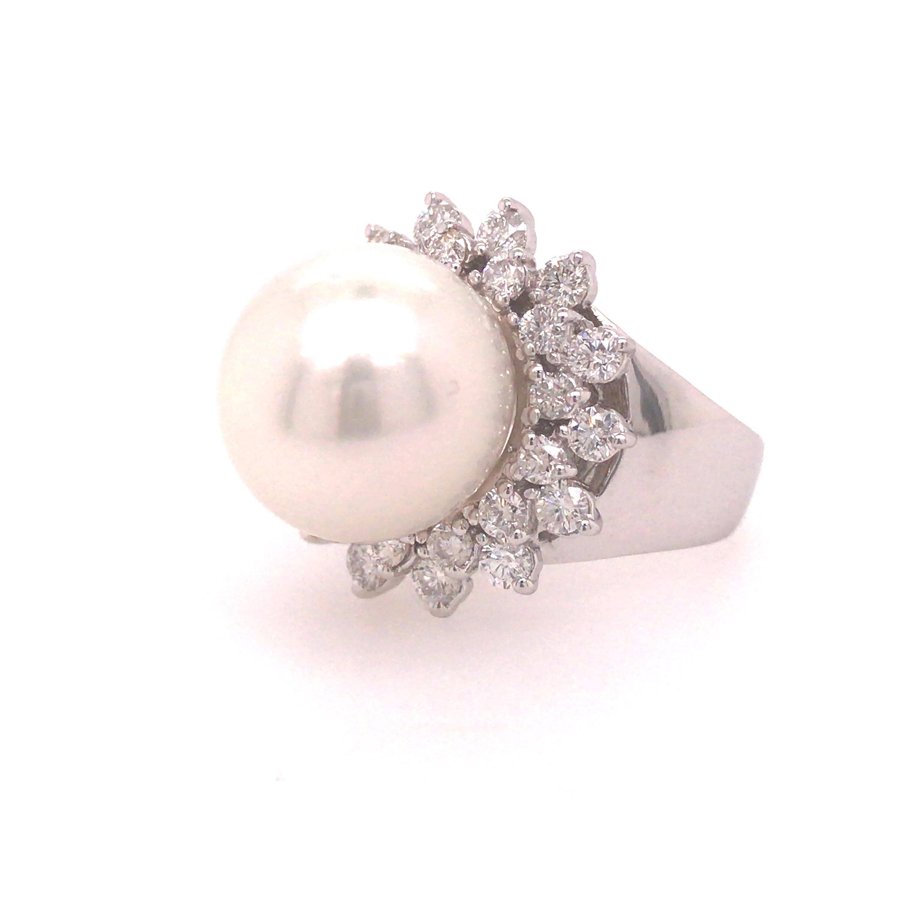 Platinum Diamond Halo 13mm Pearl Ring.  Round Brilliant Cut Diamonds weighing 1.82 carat total weight, G-H in color and VS-SI in clarity are expertly set.  The Halo measures 1/3/16 inch in length and 3/4 inch in width.  Ring size 7 1/2.  9.64 grams.