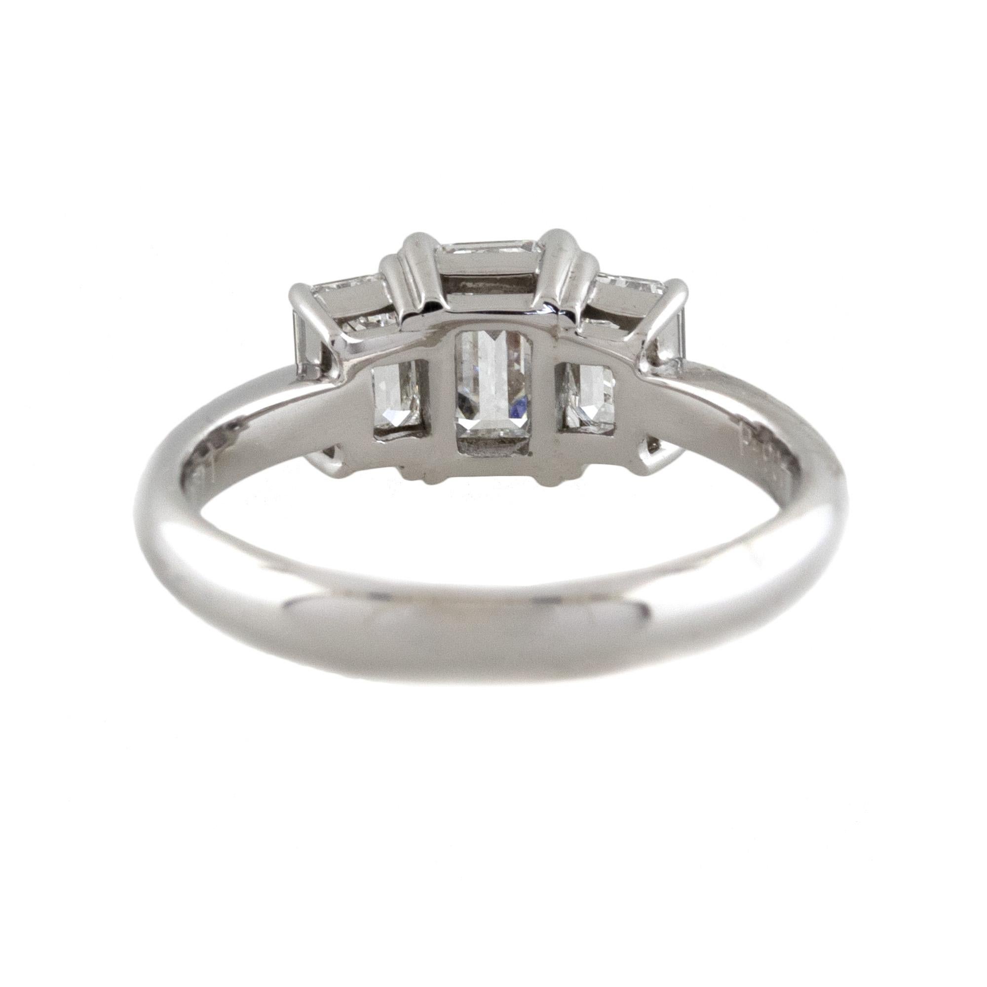 Material: Platinum
Center Diamond Details: 0.7ct Emerald cut diamond. Diamond is G/H in color and VS in clarity
Adjacent Diamond Details