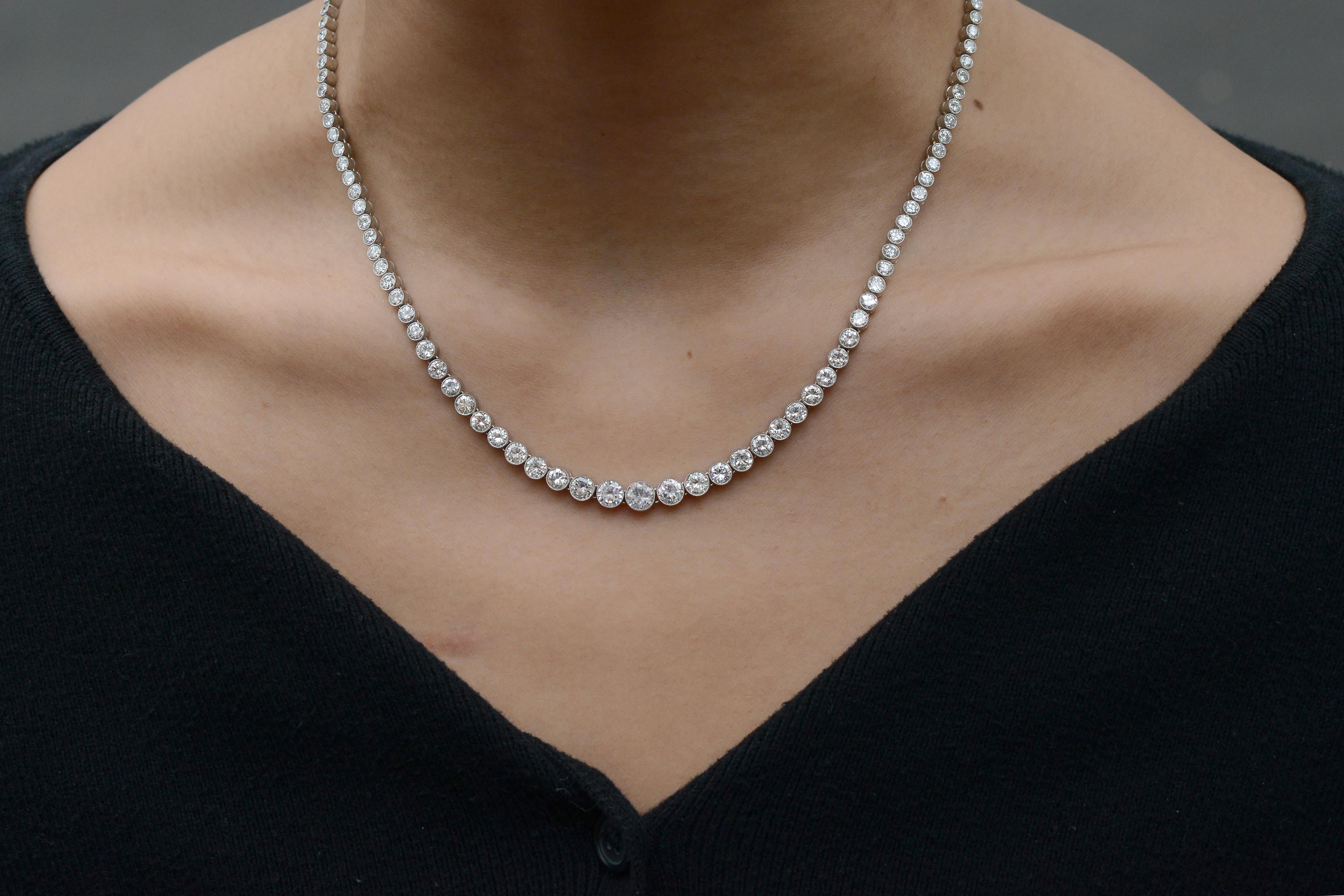 Over 14 carats of 119 flawlessly matched sparkling diamonds burst out of this elegant diamond Riviera necklace. Artfully recapturing the style of the Art Deco era with contemporary notes. You will love how the individual diamonds are surrounded by