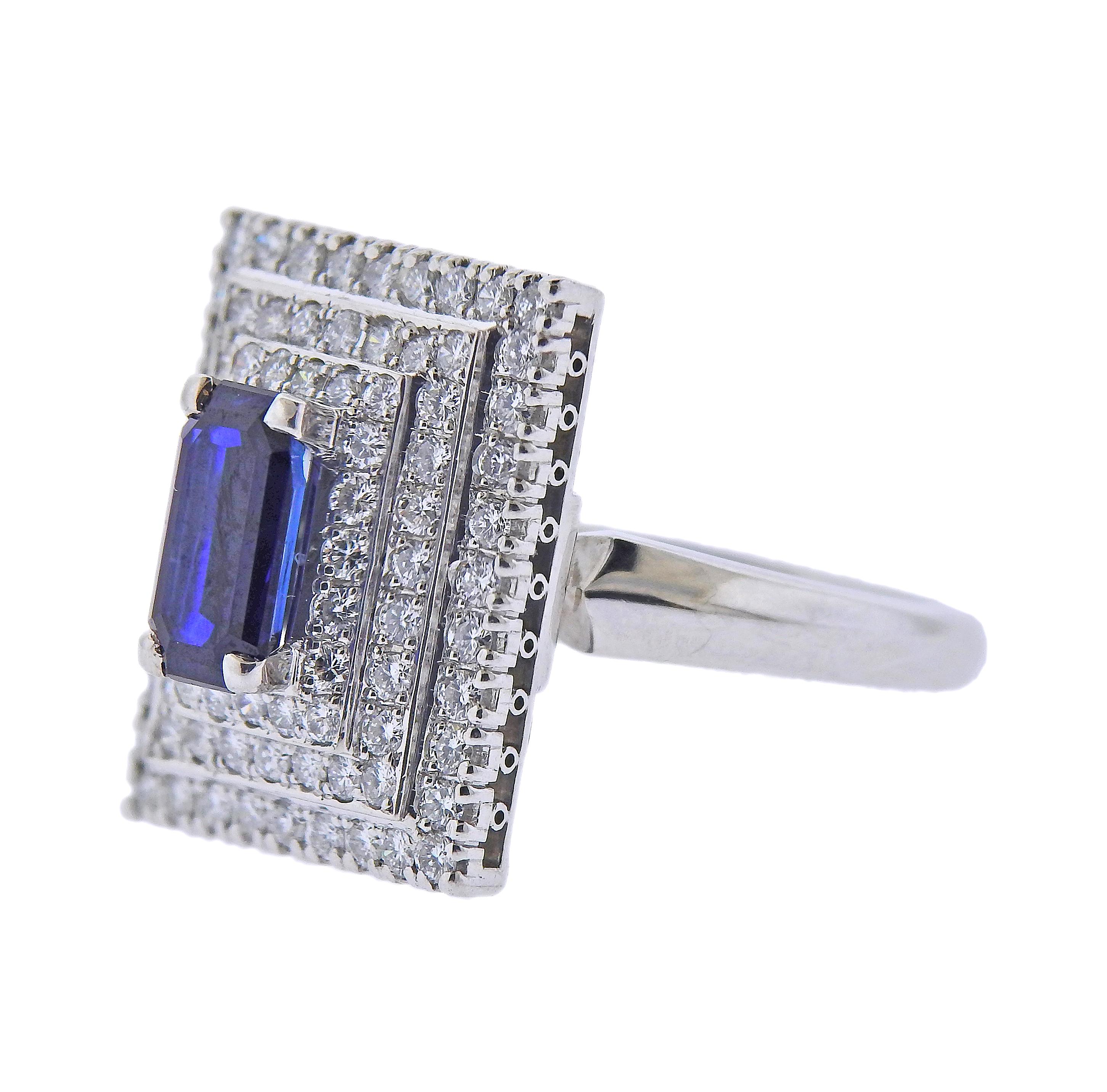 Platinum cocktail ring, with center 1.44ct sapphire, surrounded with 0.86ctw in diamonds. Ring size - 6.25, ring top - 18mm x 14mm. Marked: pt900, D0.86, S1.44. Weight - 8.9 grams. 