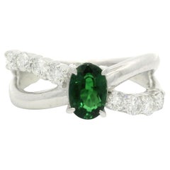 Platinum 1.44ctw Oval Vivid Green Tsavorite Diamond Crossover Design Band Ring