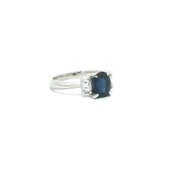 Platinum 1.47ctw Oval Royal Blue Sapphire Baguette Diamond Accents Sides Ring