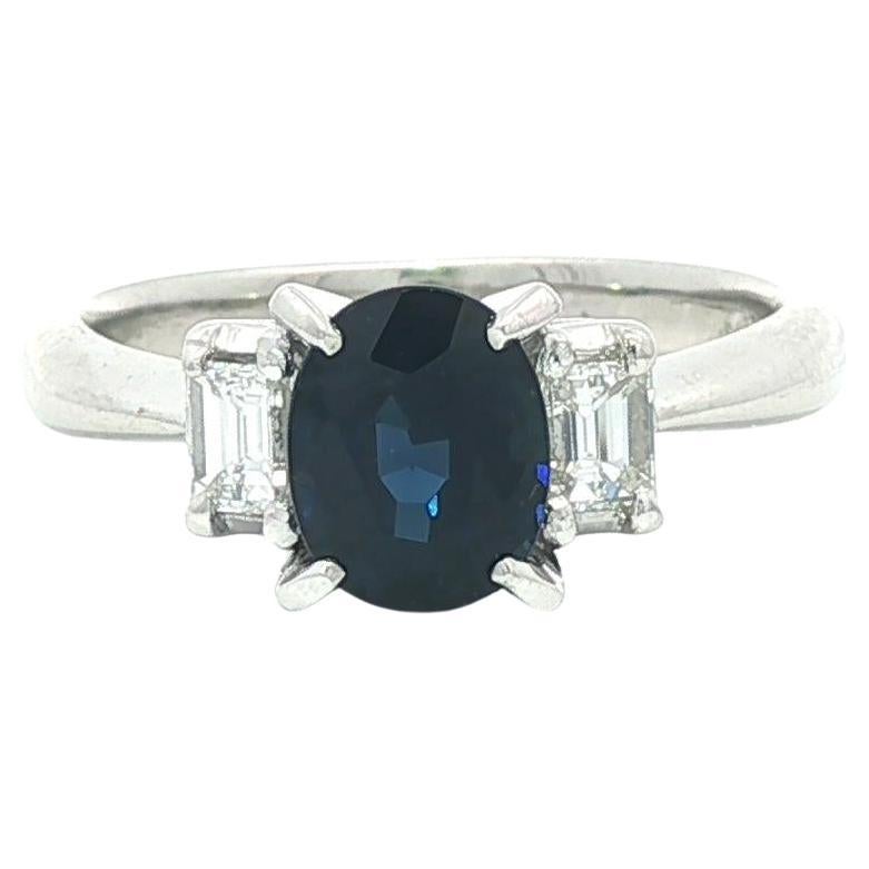 Platinum 1.47ctw Oval Royal Blue Sapphire Baguette Diamond Accents Sides Ring