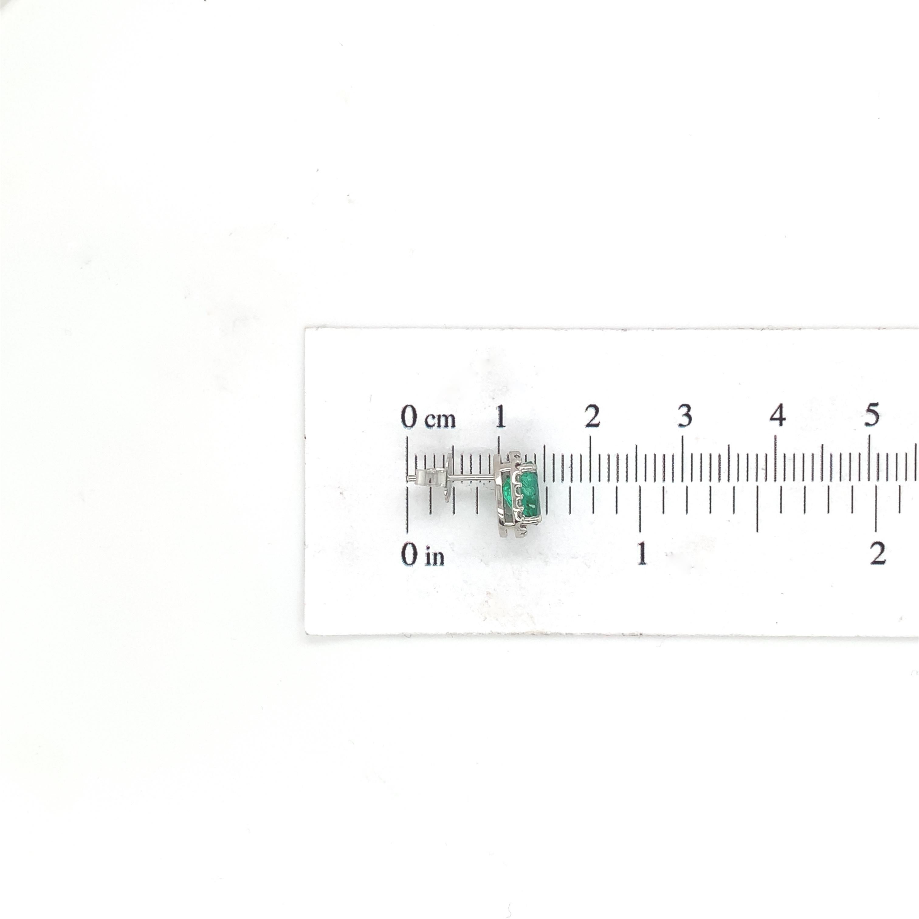 Oval Cut Platinum 1.48cttw Fine Emerald and Diamond Stud Earrings For Sale