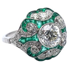 Anello in platino con diamante e smeraldo taglio europeo antico da 1,49 carati