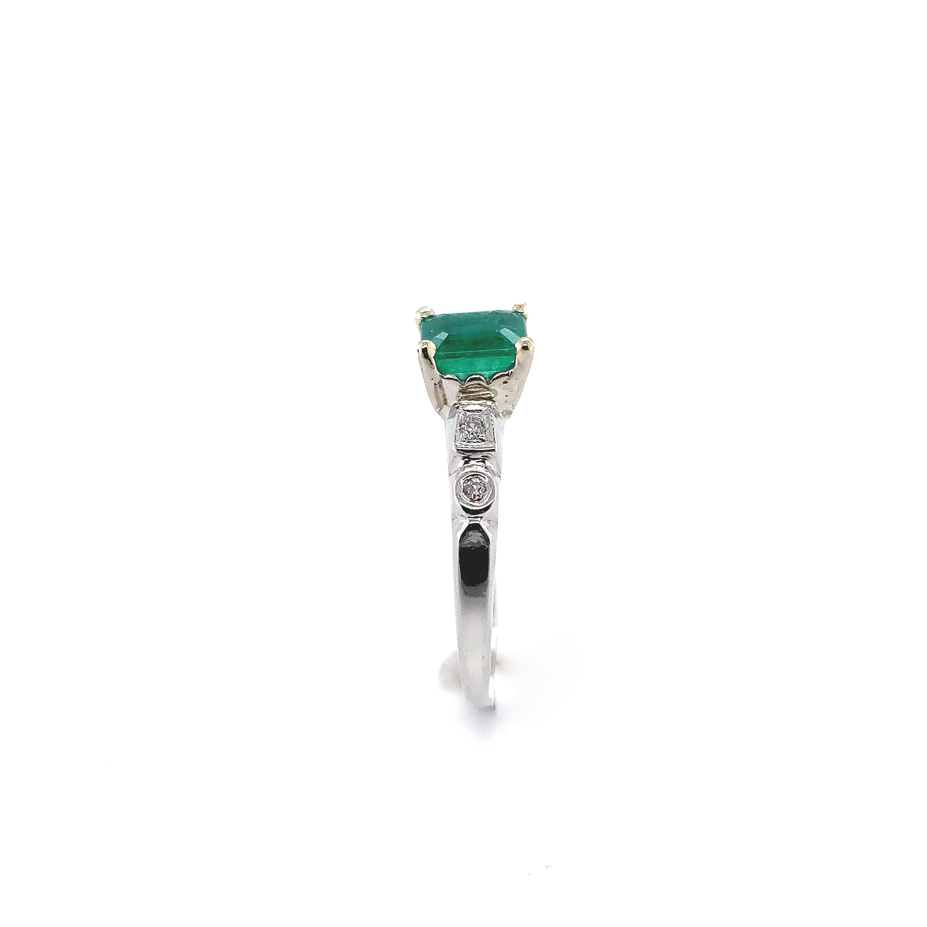 Modern Platinum + 14K .82ct Emerald & Diamond Ring For Sale