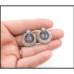 Boucles d'oreilles pendantes aigue-marine et diamant en platine et or blanc 14k