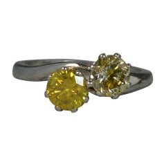 Platinum 1.50 Carat Yellow Diamond Ladies Toi et Moi Twist Engagement Ring