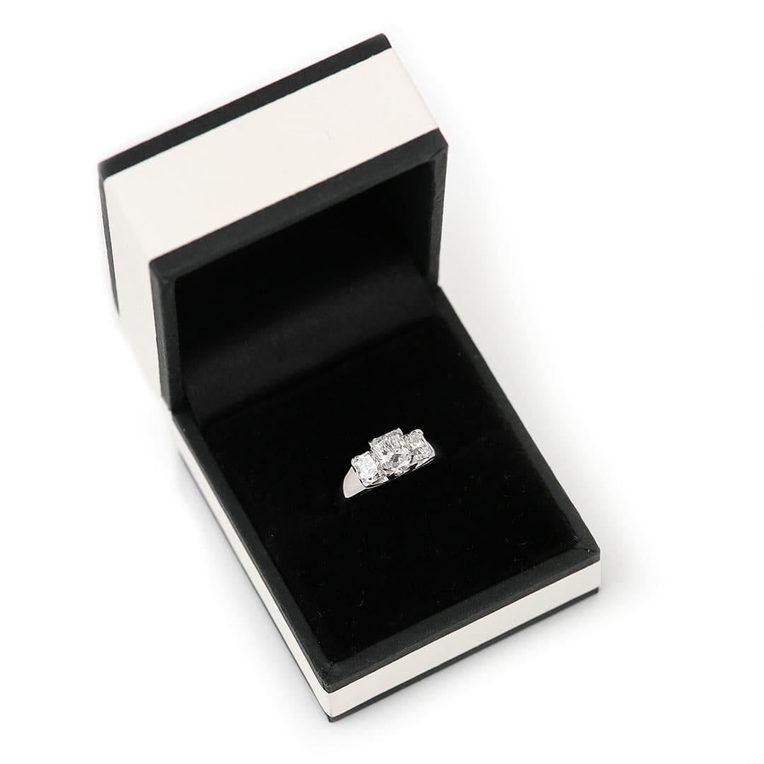 Platinum 1.50ct IGI Certified E Color Three Stone Diamond Ring For Sale 7