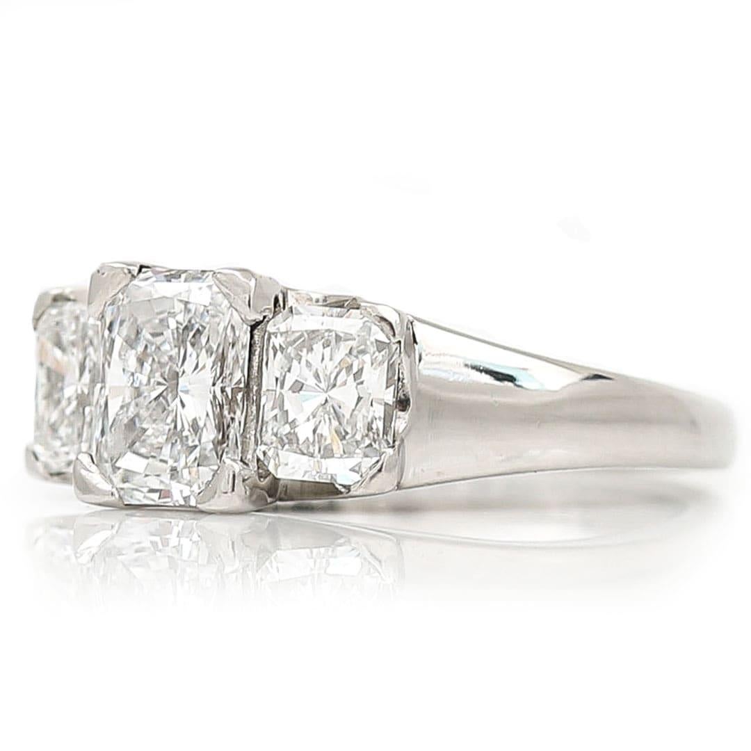 Contemporary Platinum 1.50ct IGI Certified E Color Three Stone Diamond Ring For Sale