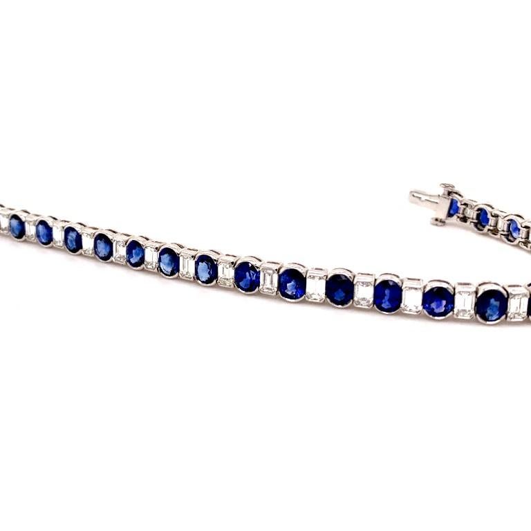 Unique design platinum sapphire with the total weight of 15.60 carat together with 6.11 carat diamond bracelet               