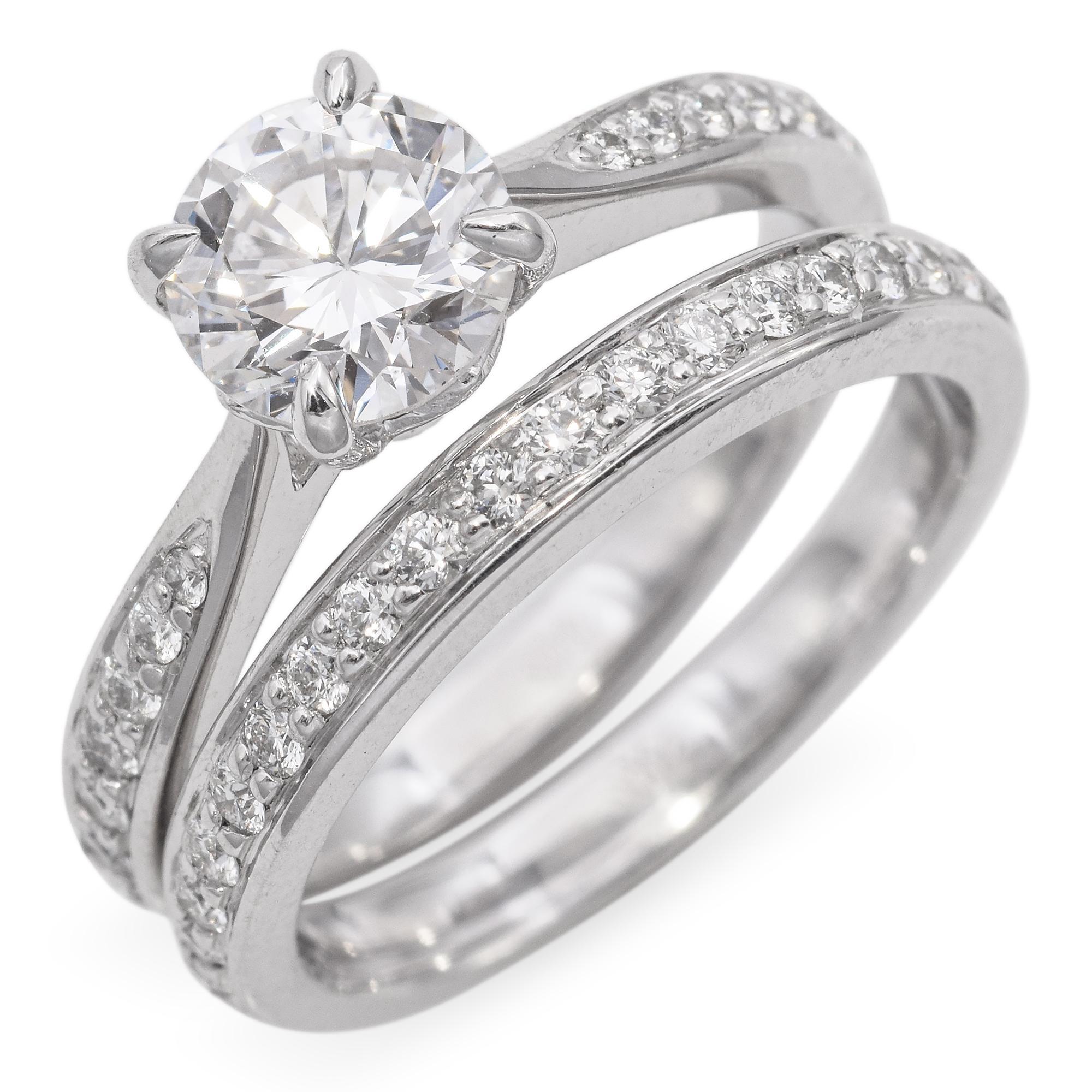 Set Weight: 8.1 Grams
Ring Size: 4.5
Hallmark: PT950, Maker's Mark

Engagement Ring:
Weight: 4.2 grams
Stone: 1.26 TCW Diamond, Round Brilliant Center Stone 0.85 ct., Graduated Round Side Stones: 0.002-0.01 ct.
Center Stone Grade: Color: F, Clarity: