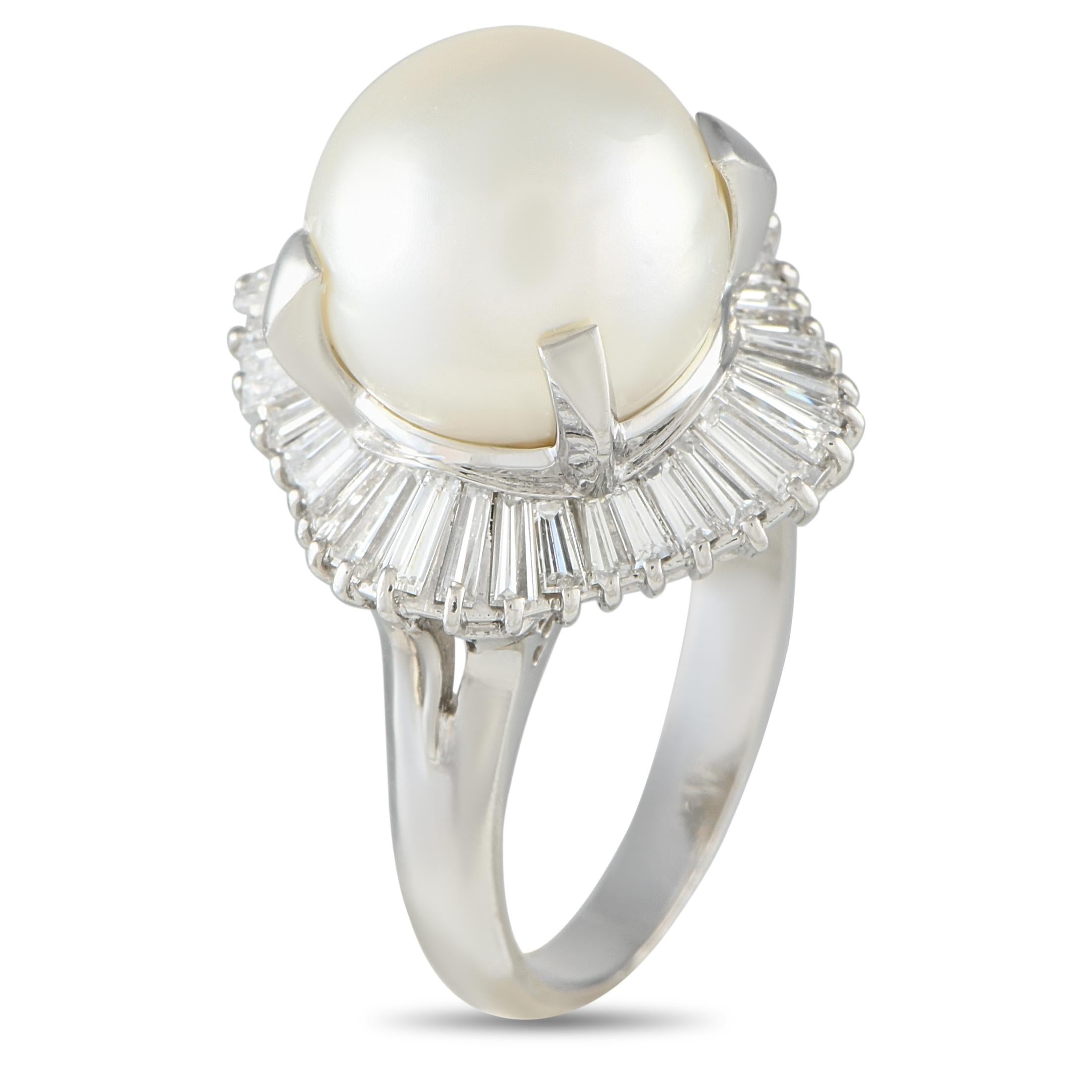 This impressive ring is uniquely elegant in design. On this exciting accessory, a Pearl center stone is surrounded by a sparkling halo of Diamonds totaling 1.69 carats. This pieces Platinum setting features a 5mm wide band and a 25mm top height.This